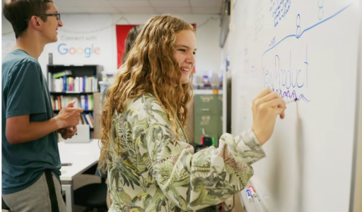 Students work on a pre-college coding project in an LMU computer science lab
